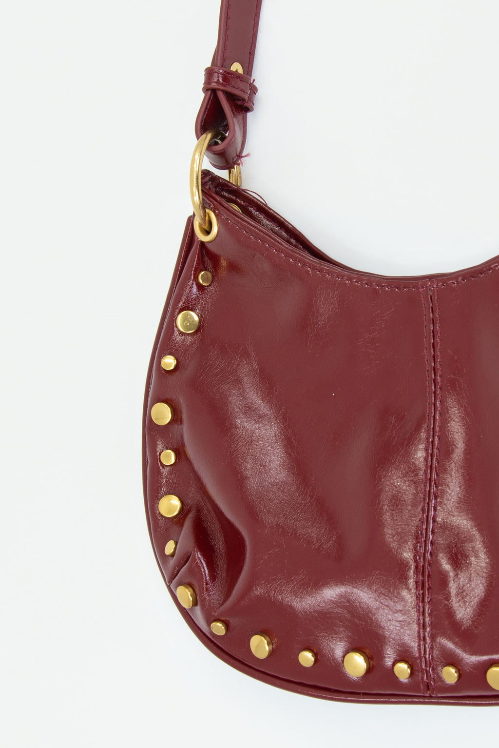 Bolso de Mano color vino con tachas Doradas