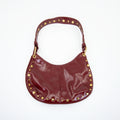 Bolso de Mano color vino con tachas Doradas